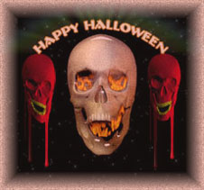 happy halloween graphic with 3 skulls